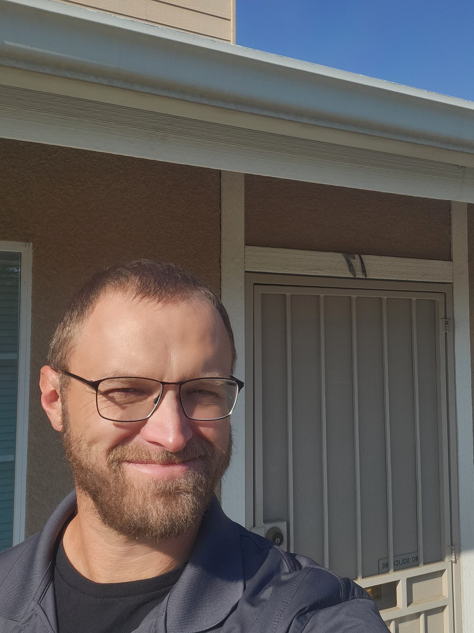 Aaron Husak outside the building where he opened his first office